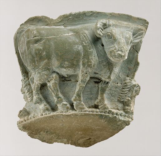 Fragment of a bowl with a frieze of bulls in relief