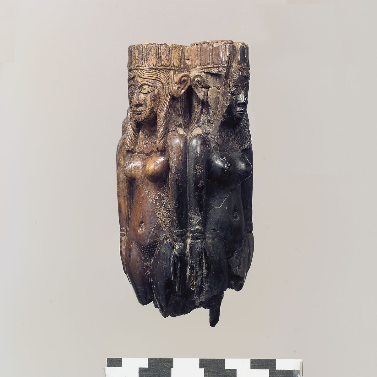 Fan or fly-whisk handle in the form of four female figures, Ivory, gold leaf, Assyrian