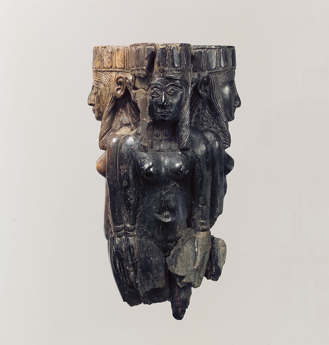 Fan or fly-whisk handle in the form of four female figures, Ivory, gold leaf, Assyrian