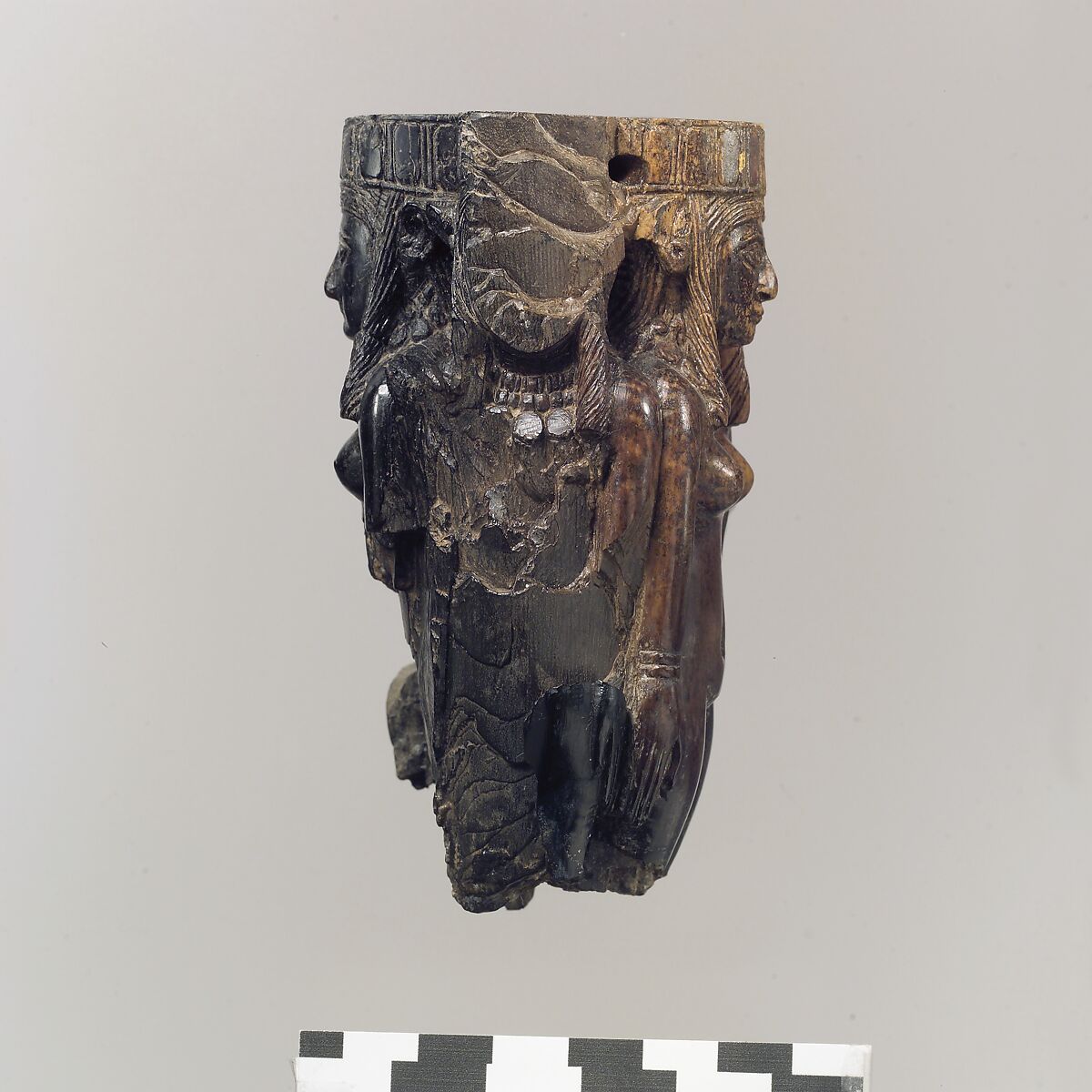 Fan or fly-whisk handle in the form of four female figures, Ivory, gold leaf, Assyrian