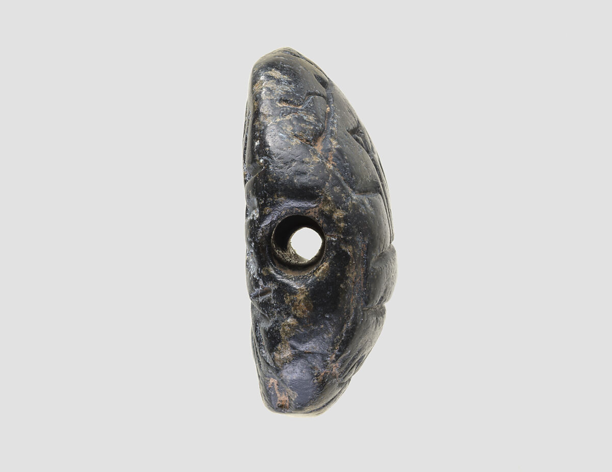 Low hemispheroid seal with later inscription, Steatite, black