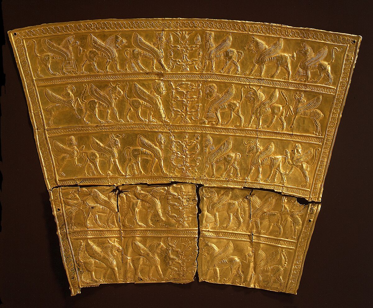 Plaque with winged creatures approaching stylized trees, Gold, Iran 