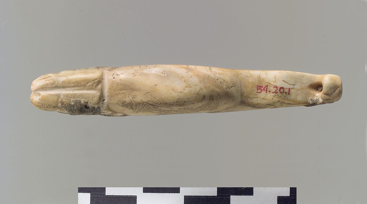 Amulet in the form of a lion with legs extended, Shell