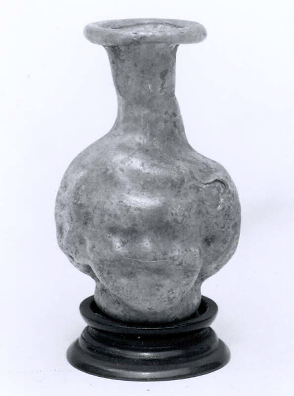 Head-shaped flask, Glass, Roman 