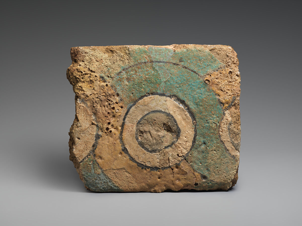 Brick fragment with a guilloche design, Ceramic, glaze, Assyrian 