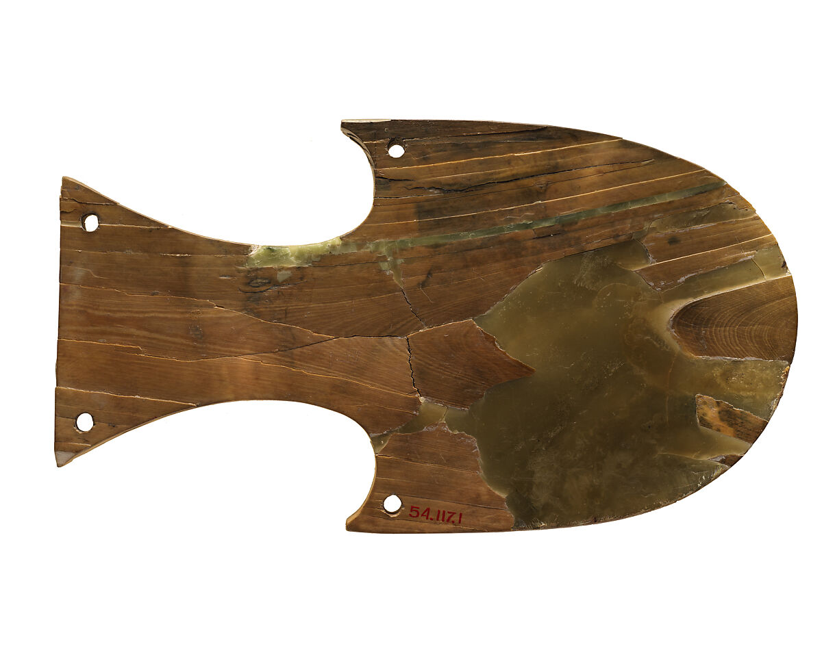 Horse blinker carved in relief with a seated sphinx, Ivory, Assyrian