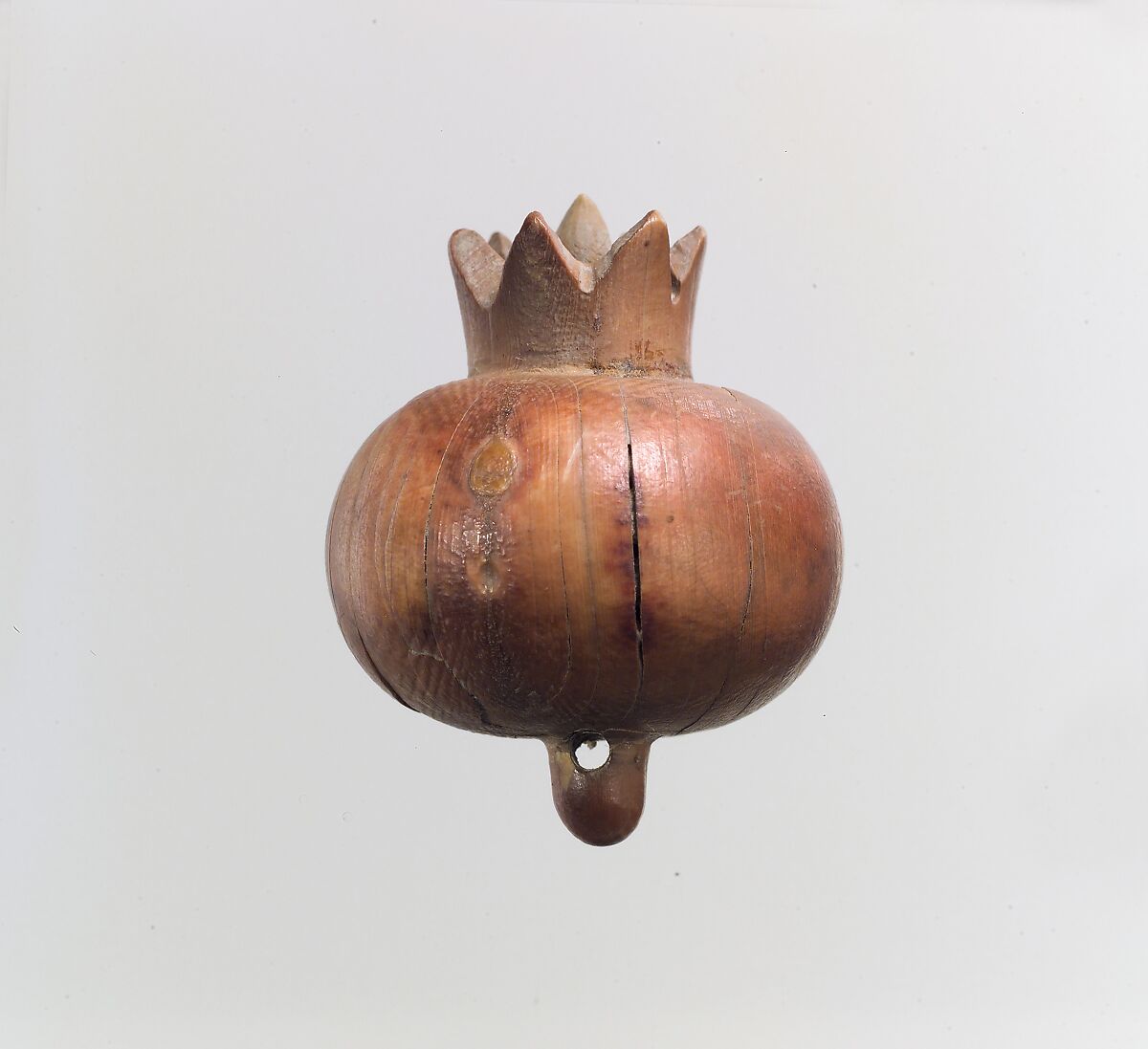 Pomegranate carved in the round, Ivory, Assyrian 