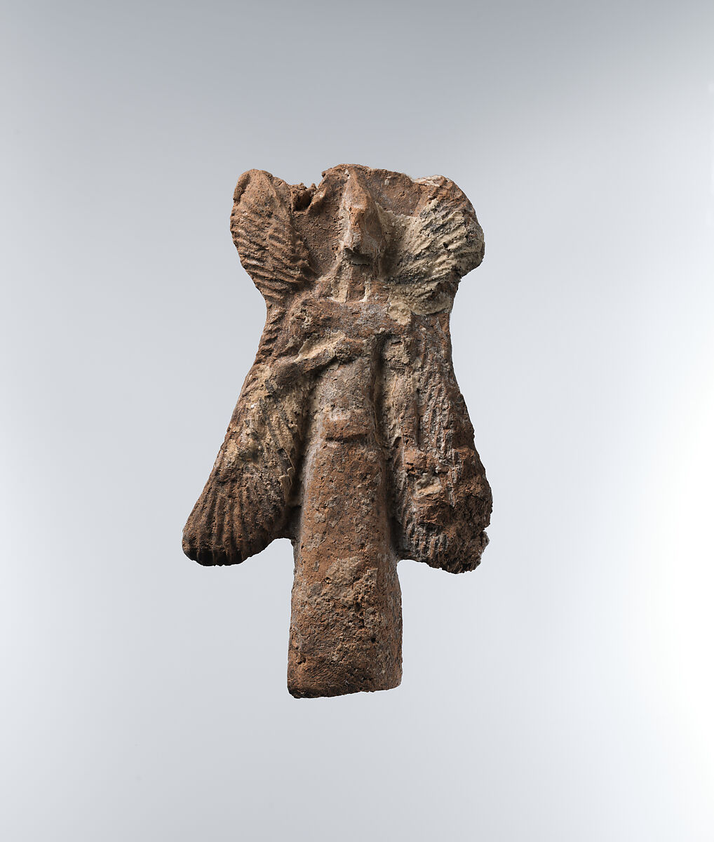 Apkallu figure: bird-headed, winged figure carrying a bucket, Ceramic, Assyrian 
