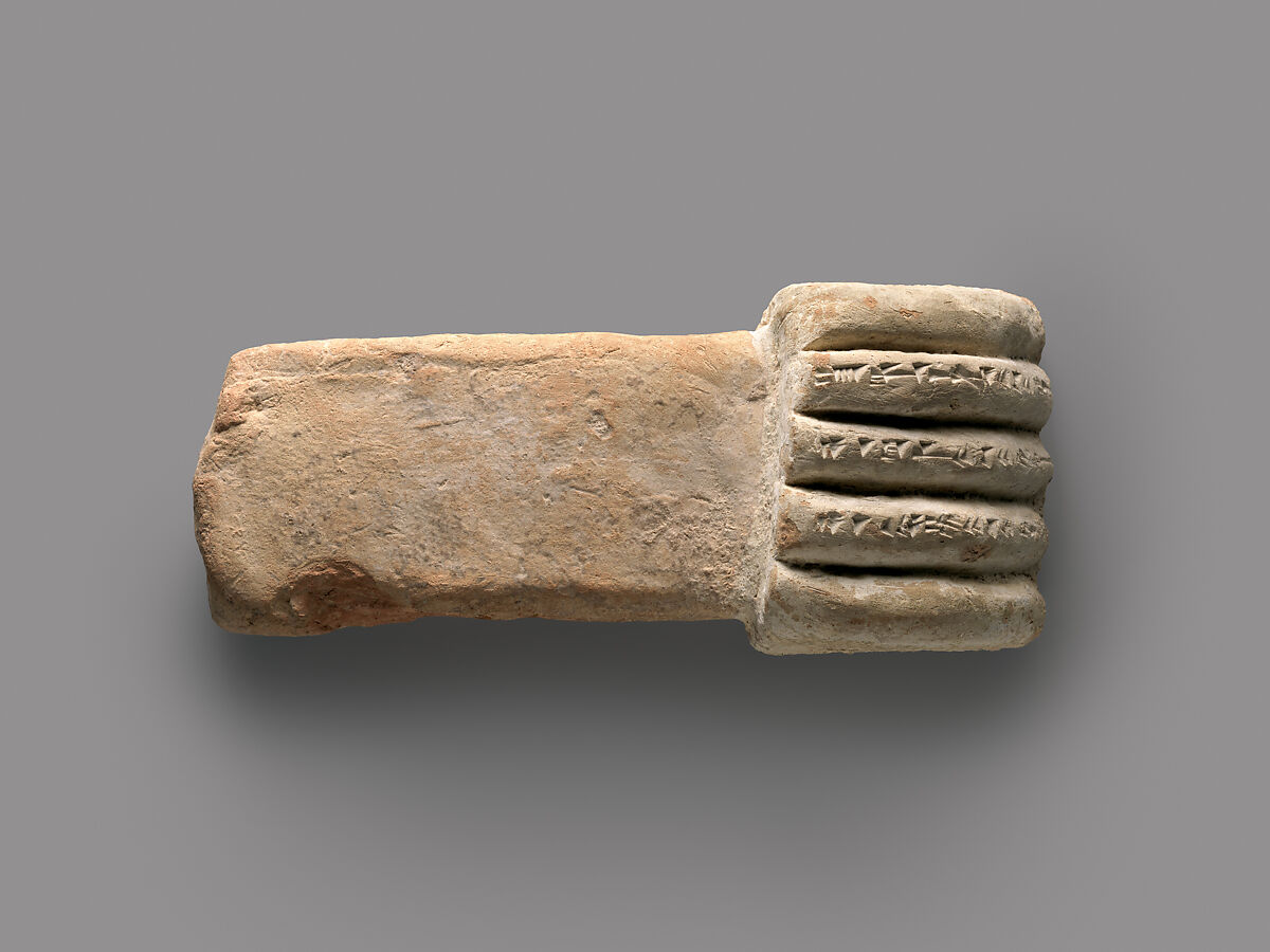 Miniature corbel in the shape of a hand, Ceramic, glaze, Assyrian 