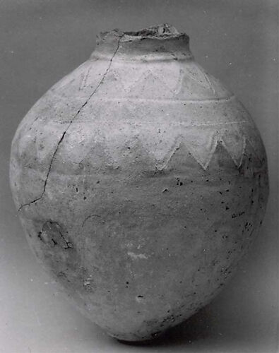 Jar with geometric decoration