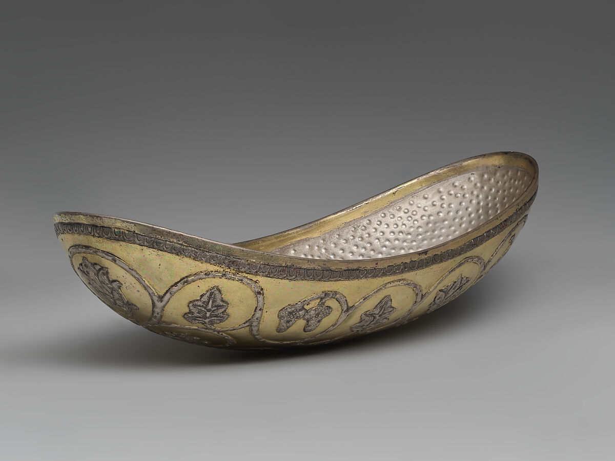 Oval bowl with grapevine scrolls inhabited by birds and animals, Silver, mercury gilding, Sasanian