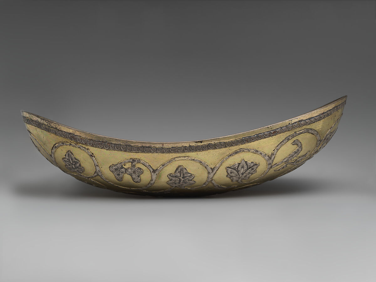 Oval bowl with grapevine scrolls inhabited by birds and animals, Silver, mercury gilding, Sasanian