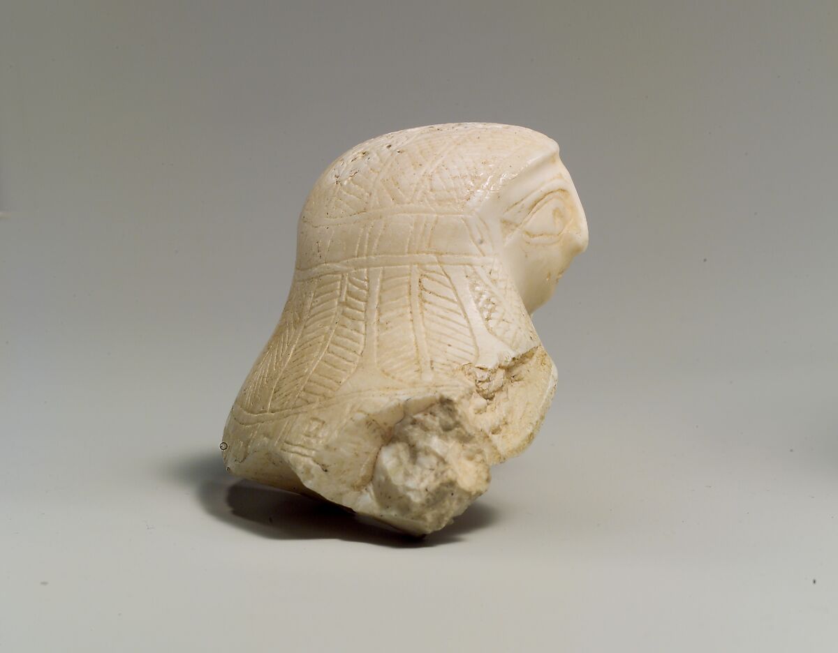 Fragment of a shell with a sculpted female head, Shell (Tridacna squamosa)