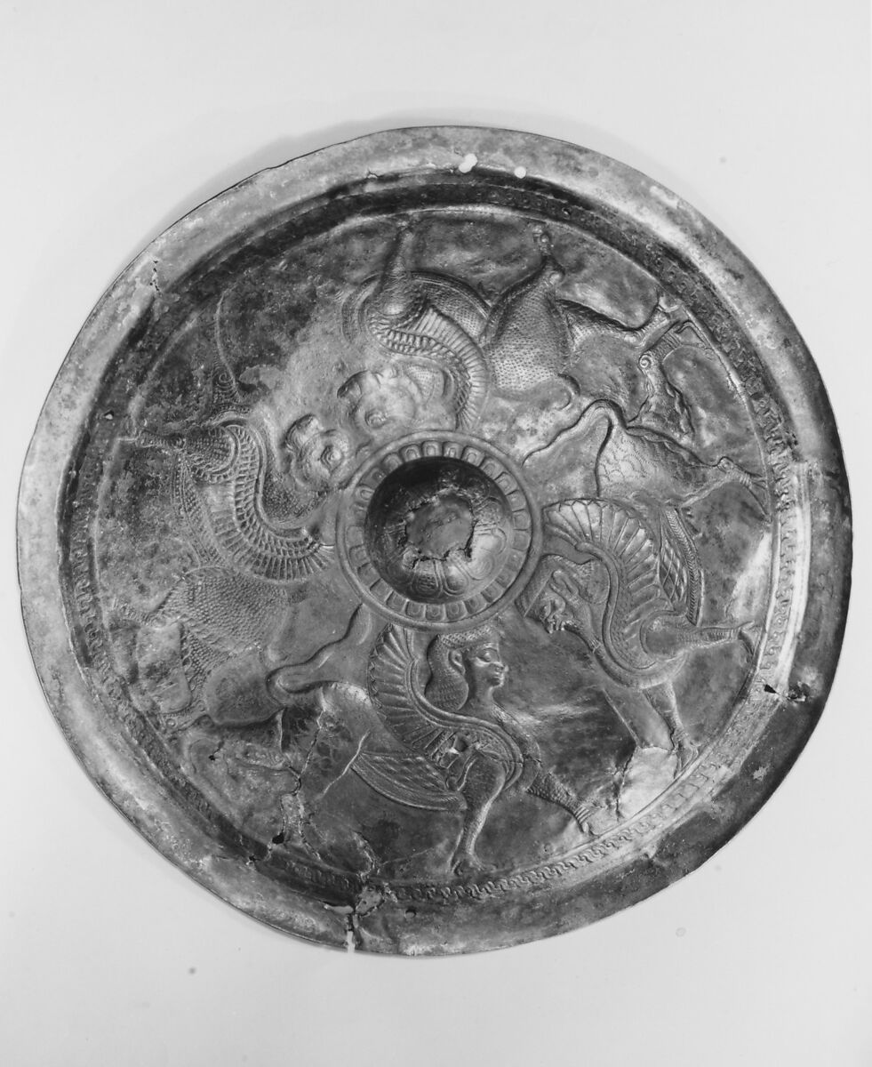 Disc with sphinxes and winged bulls, Bronze, Iran 