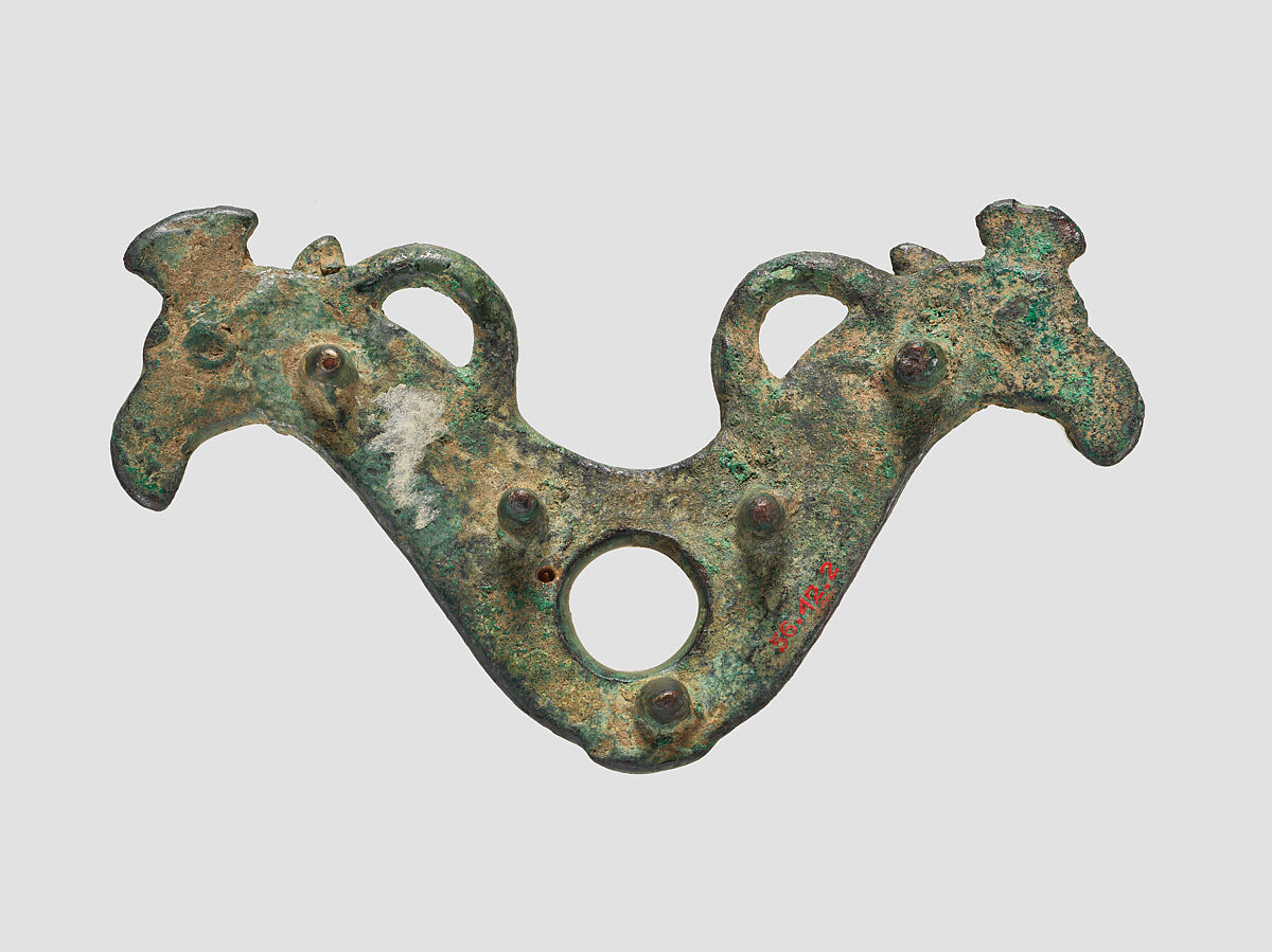 Horse bit cheekpiece in form of addorsed griffin heads, Bronze, Iran