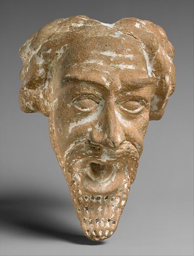 Spout in the form of a man's head