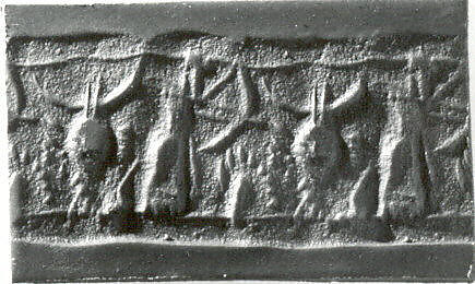 Cylinder seal with hunting scene, Faience, Assyrian 