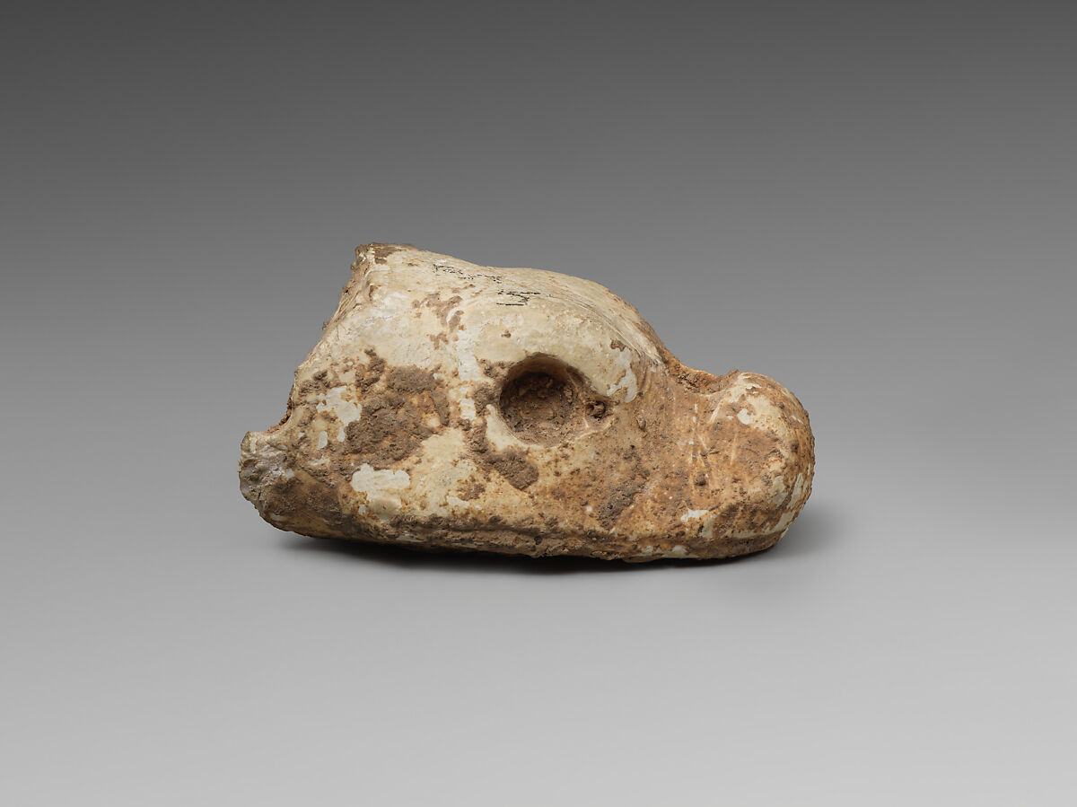 Head of mushhushshu, Stone, Assyrian
