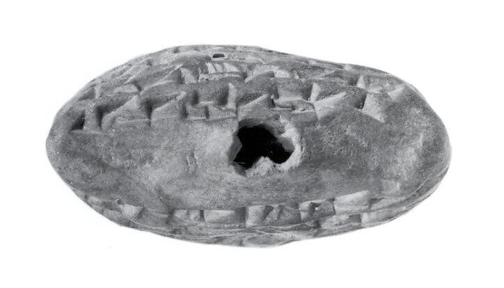 Triangular label impressed with stamp seal: for grain loan, Clay, Assyrian