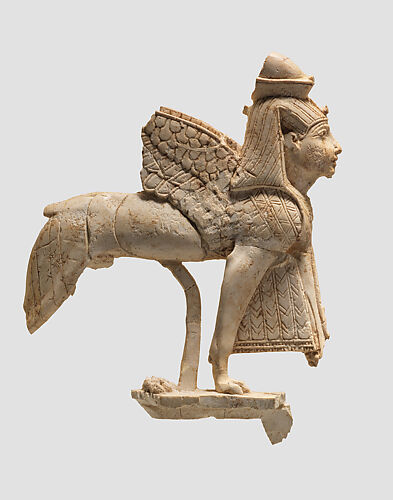 Openwork furniture plaque with a striding sphinx
