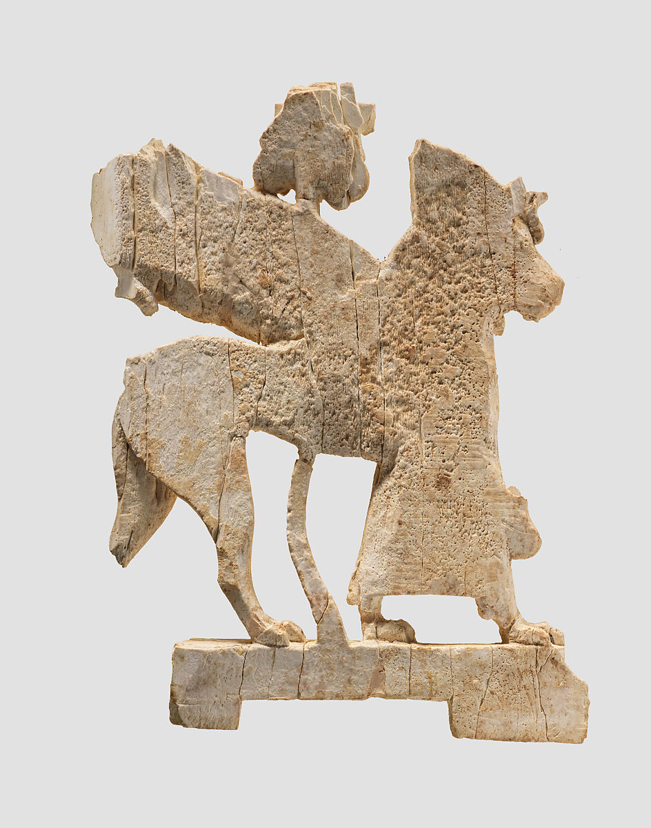 Openwork furniture plaque with ram-headed sphinx, Ivory, Assyrian