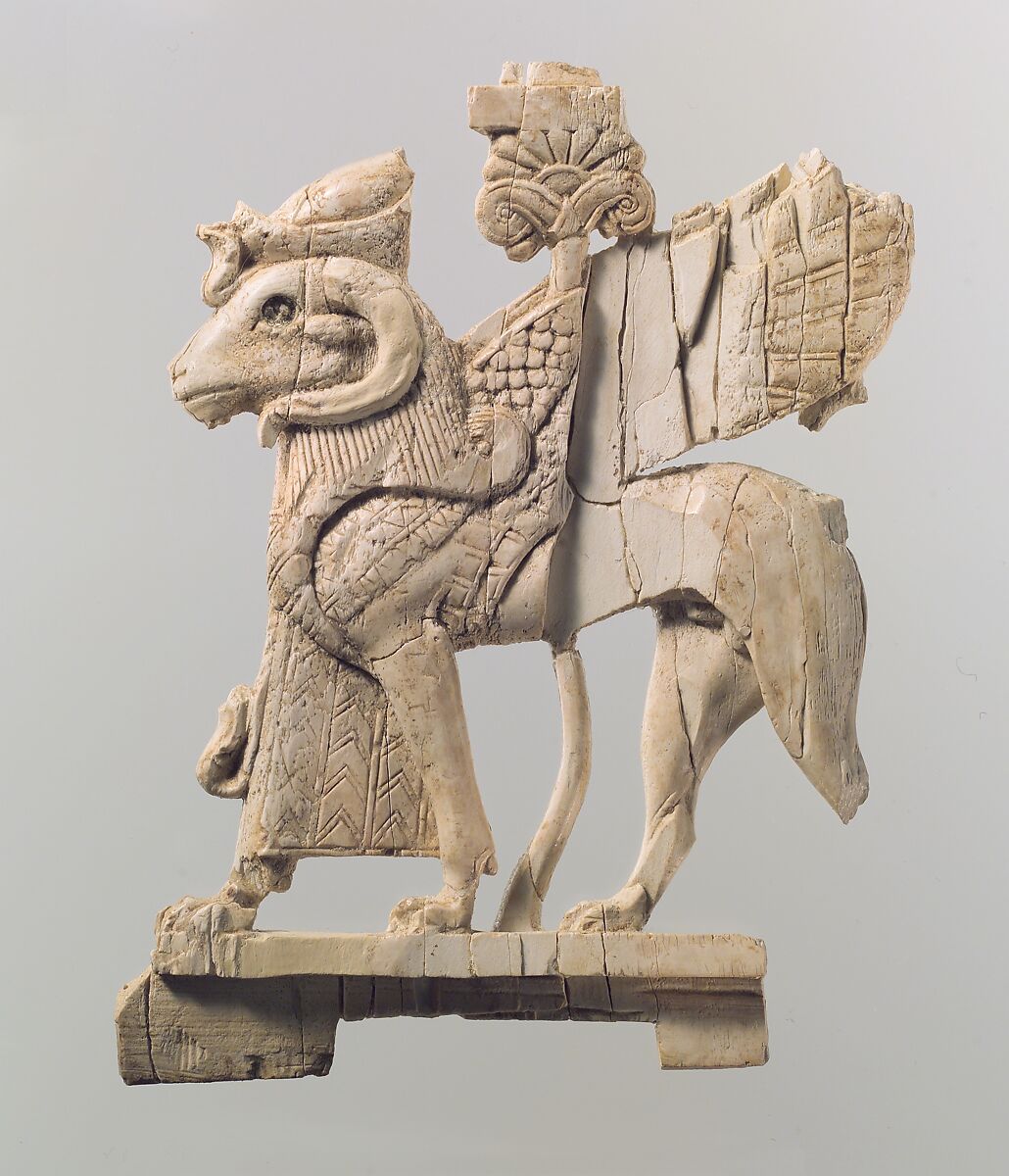 Openwork furniture plaque with ram-headed sphinx, Ivory, Assyrian 