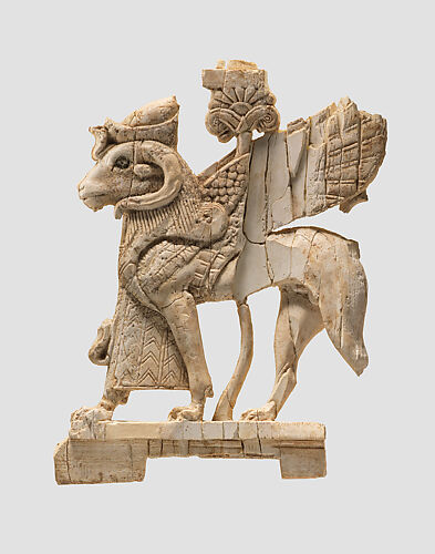 Openwork furniture plaque with ram-headed sphinx
