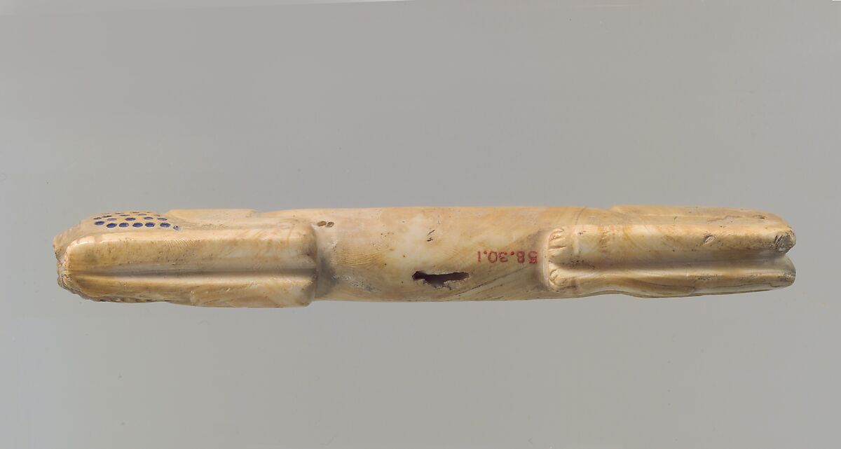 Amulet in the form of a couchant lion, Shell