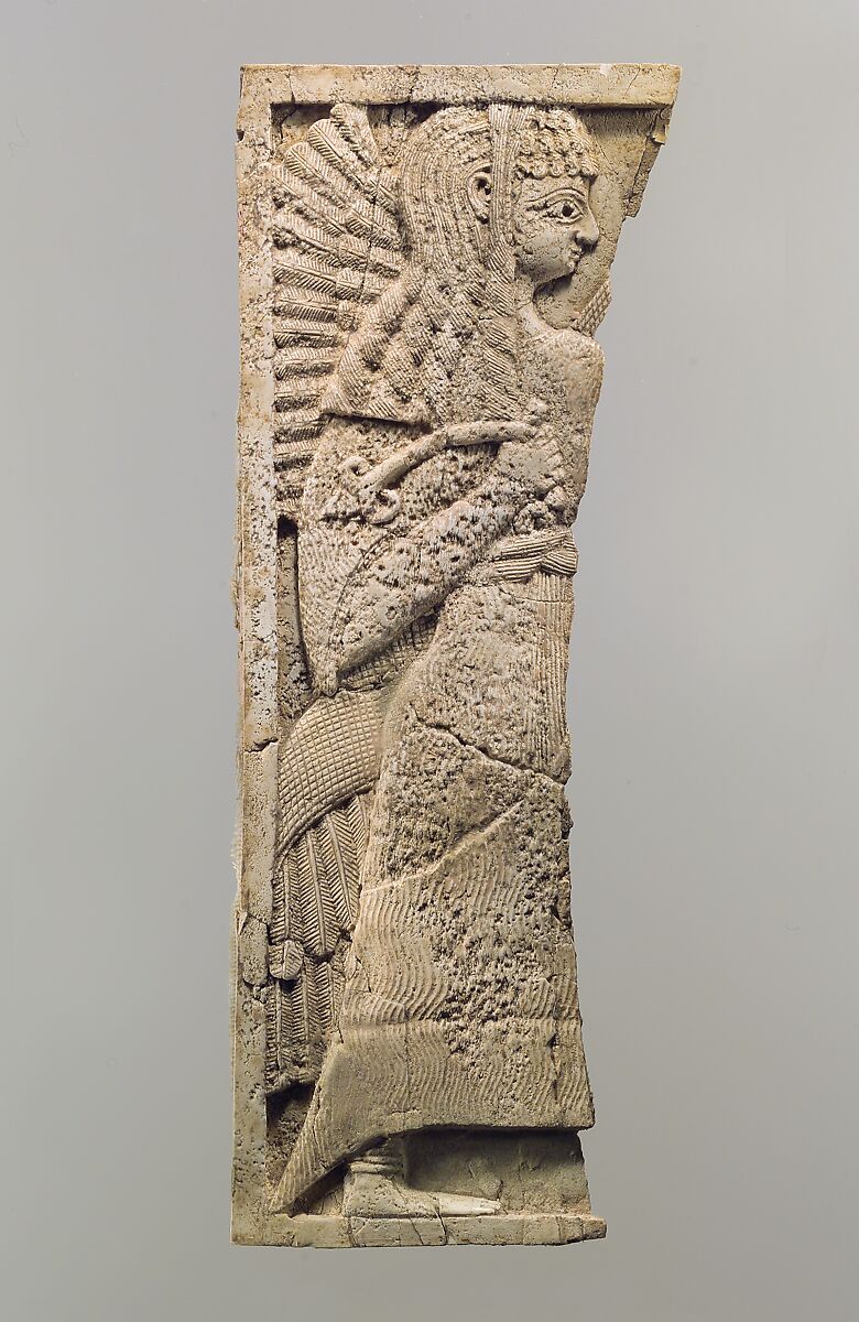 Furniture plaque carved in relief with standing woman, Ivory, Assyrian 