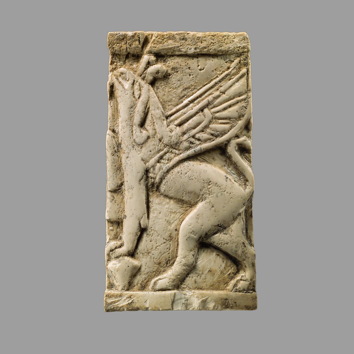 Plaque with griffin, Ivory, Assyrian 