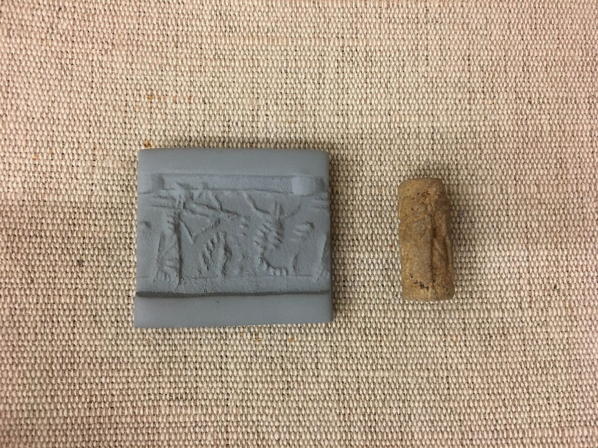 Cylinder seal with hunting scene, Faience, Assyrian