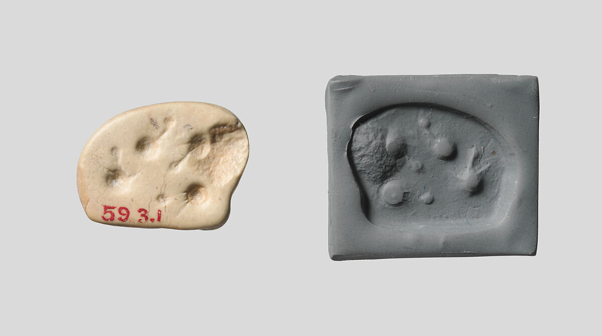 Seal amulet in the form of a recumbent bovid, Stone, cream colored