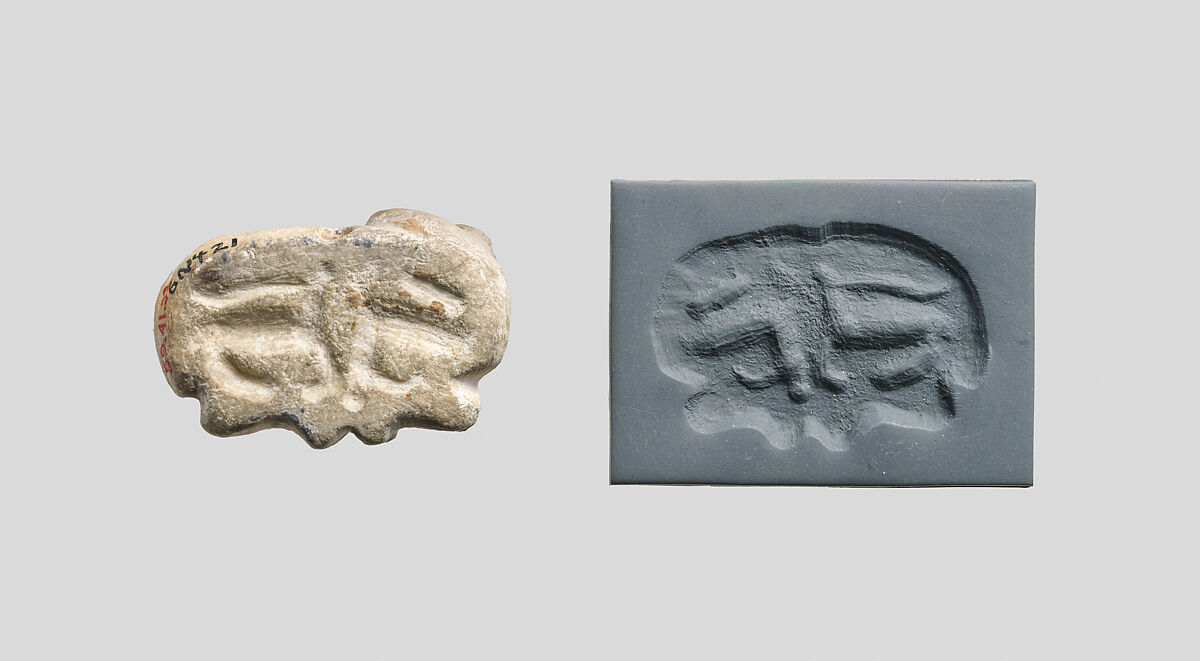 Seal amulet in the form of a reclining cow, Stone