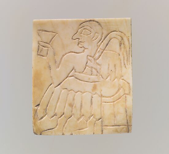 Inlay: seated male with cup and palm frond