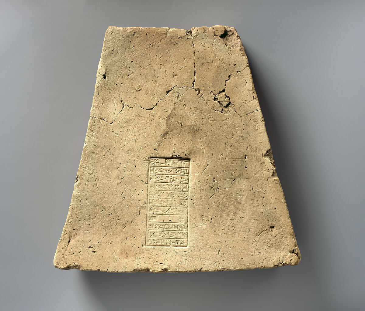 Brick with inscription of Ashurbanipal describing building work on Ekur, the temple of the god Enlil at Nippur, Ceramic, Assyrian 