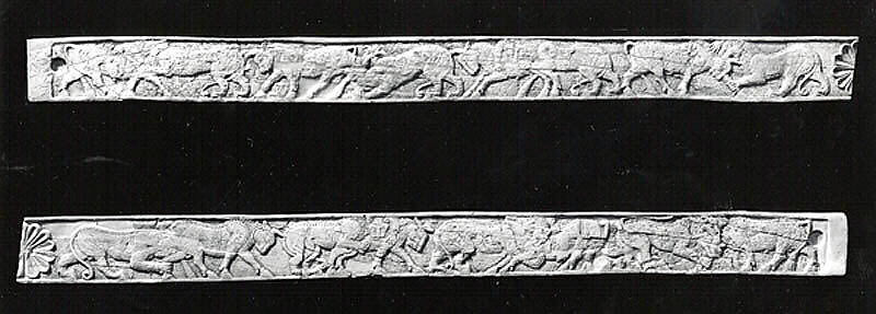 Furniture plaques carved in relief with animal combat, Ivory, Assyrian