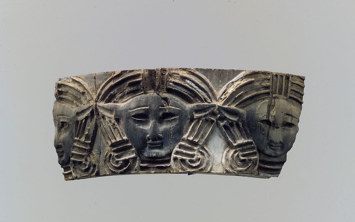 Cloisonné furniture or cosmetic box plaque with three frontal heads, Ivory, Assyrian 