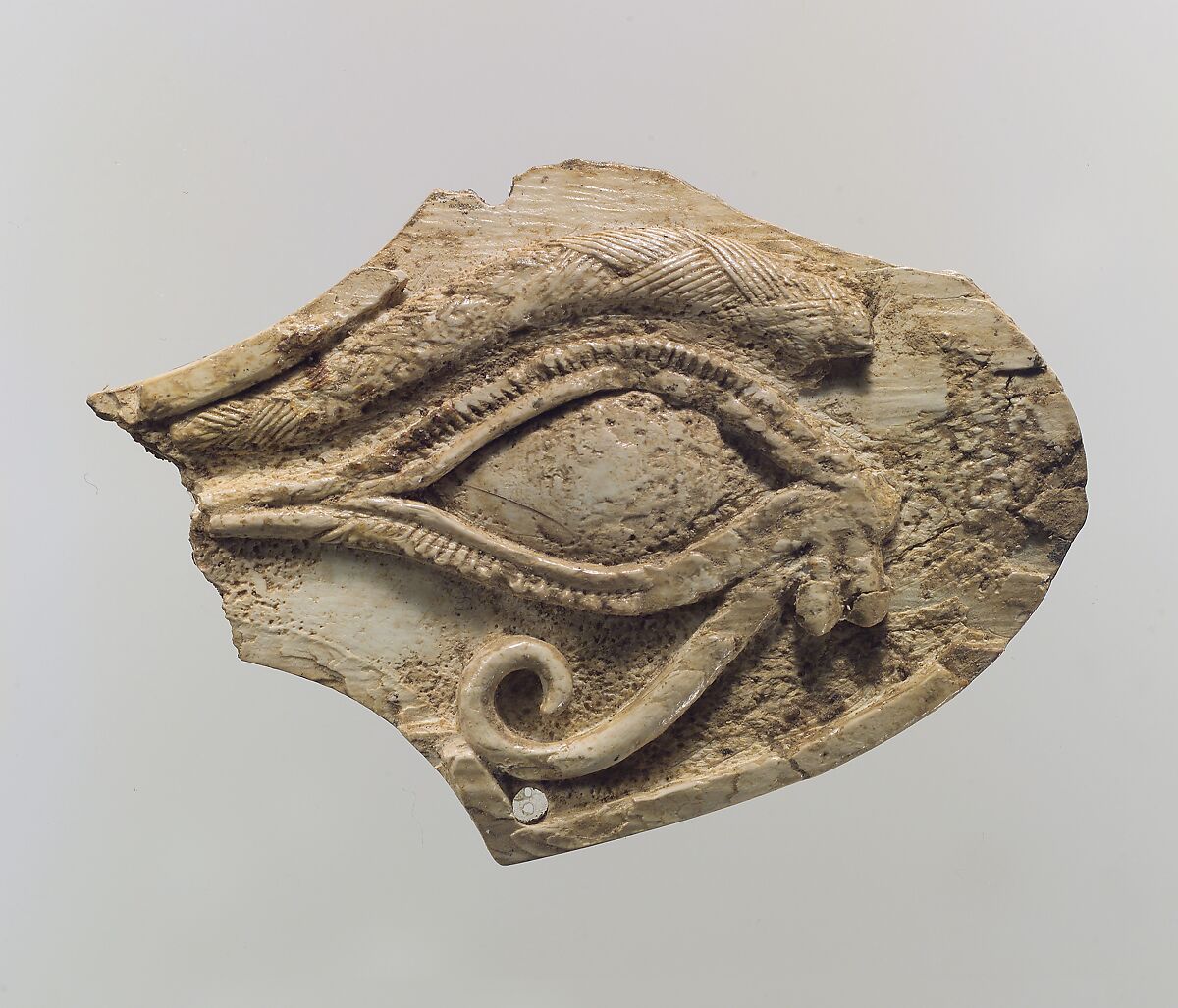 Horse blinker carved in relief with a wedjat eye, Ivory, Assyrian 