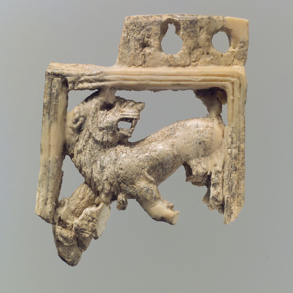 Openwork furniture plaque with lion, Ivory, Assyrian 
