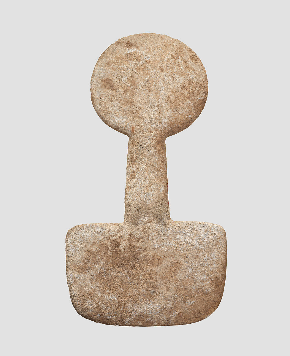 Spade-shaped schematic female (?) figure, Limestone 