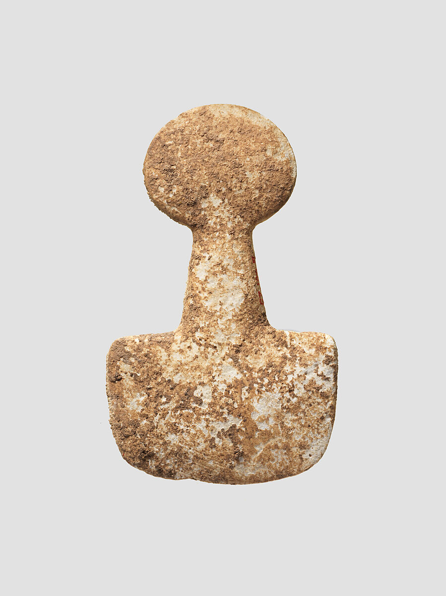 Spade-shaped schematic female (?) figure, Limestone