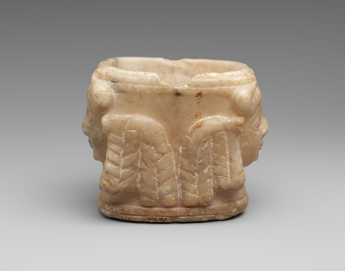 Vessel with heads of horned female deities, Gypsum alabaster, Sumerian