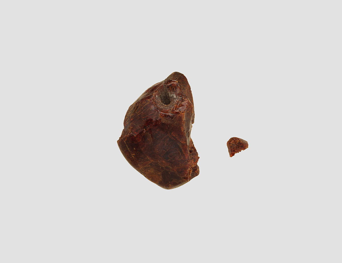 Broken bead, Amber (?), Iran 