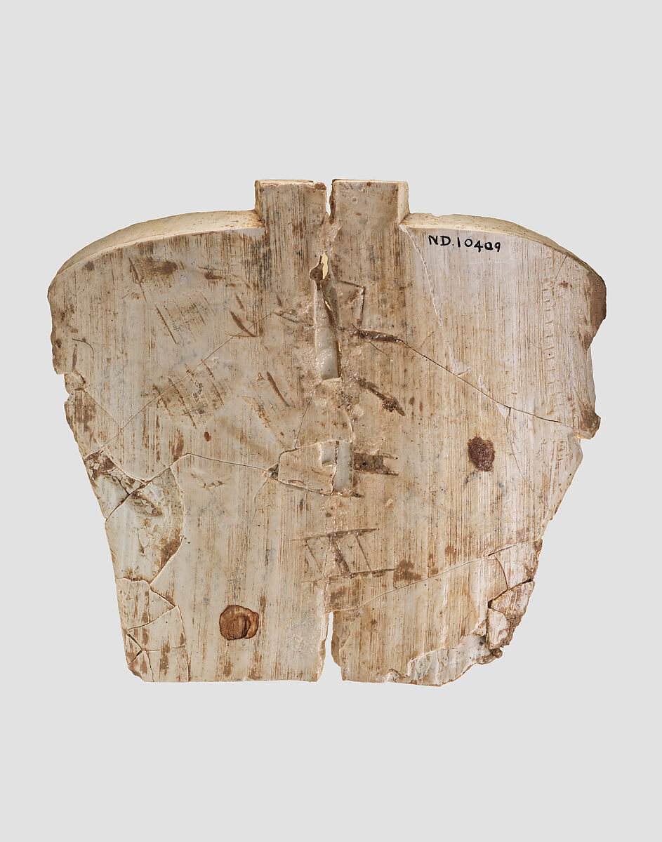 Cloisonné furniture plaque with two griffins in a floral landscape, Ivory, Assyrian