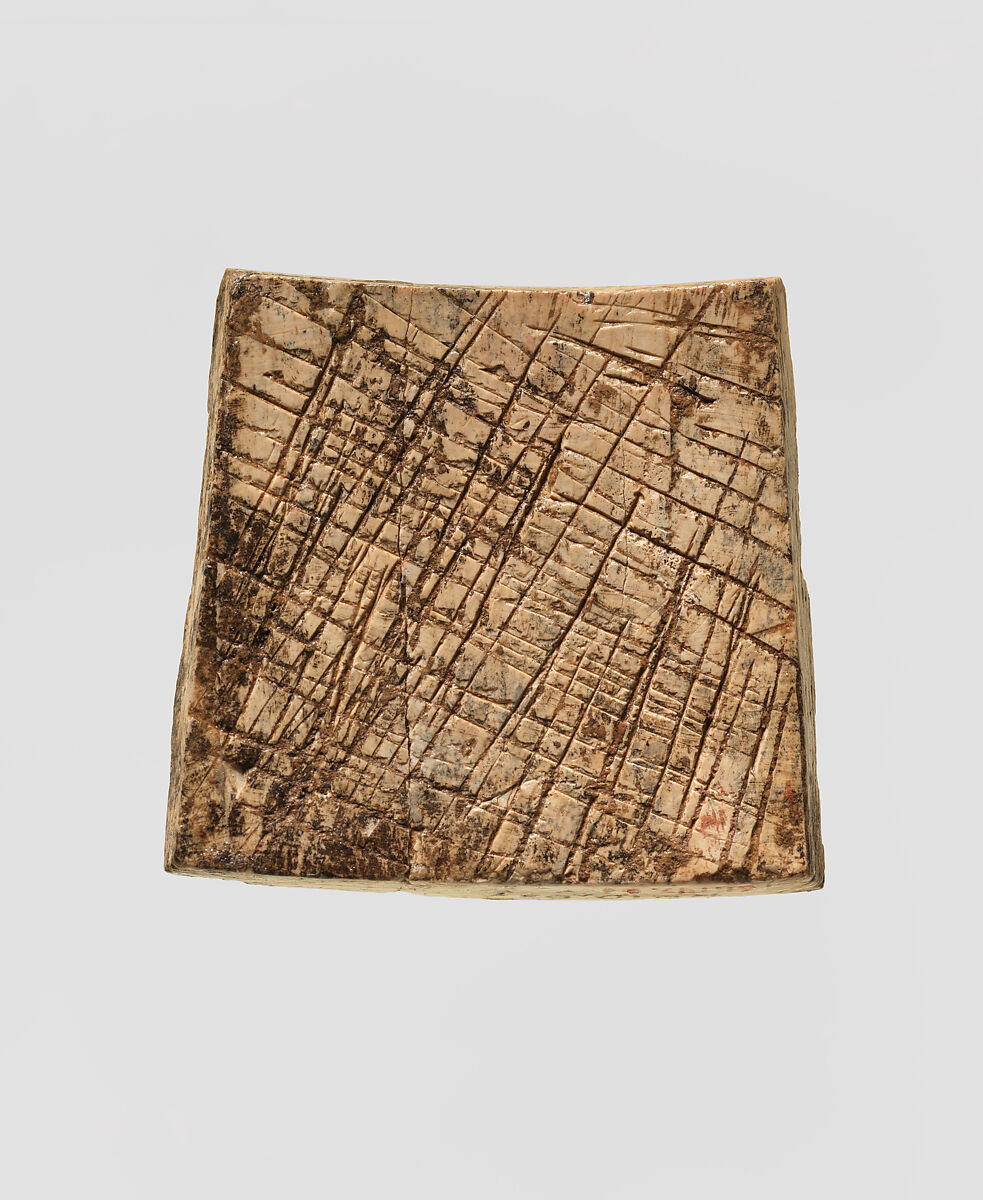 Plaque carved in relief with Egyptianizing creature, Ivory, Assyrian