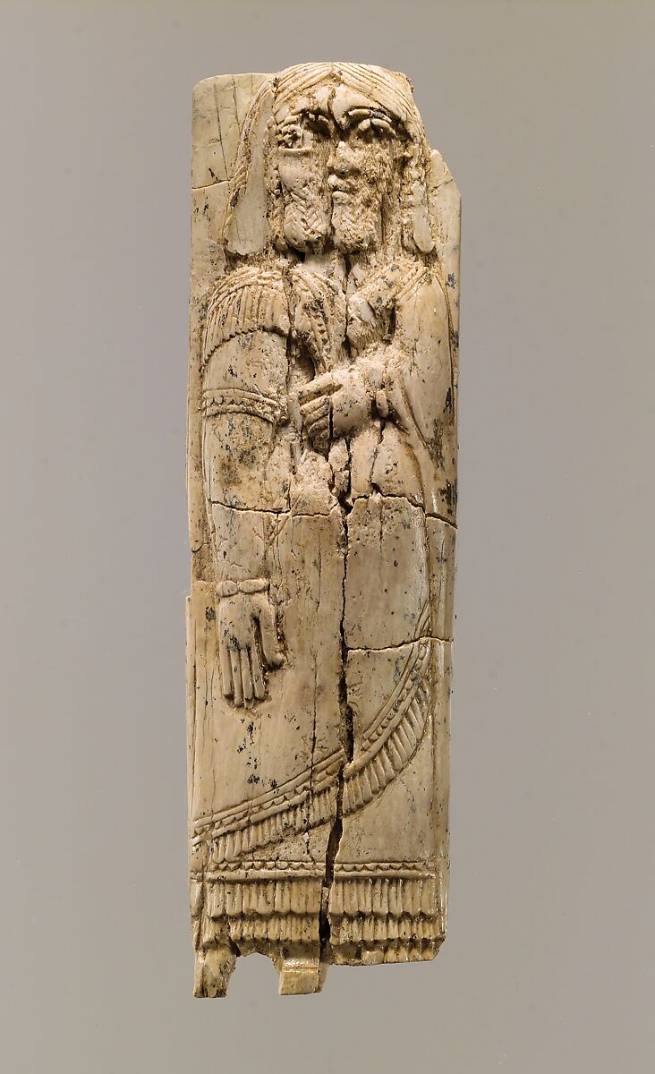Furniture plaque with figure in relief, Ivory, Assyrian 