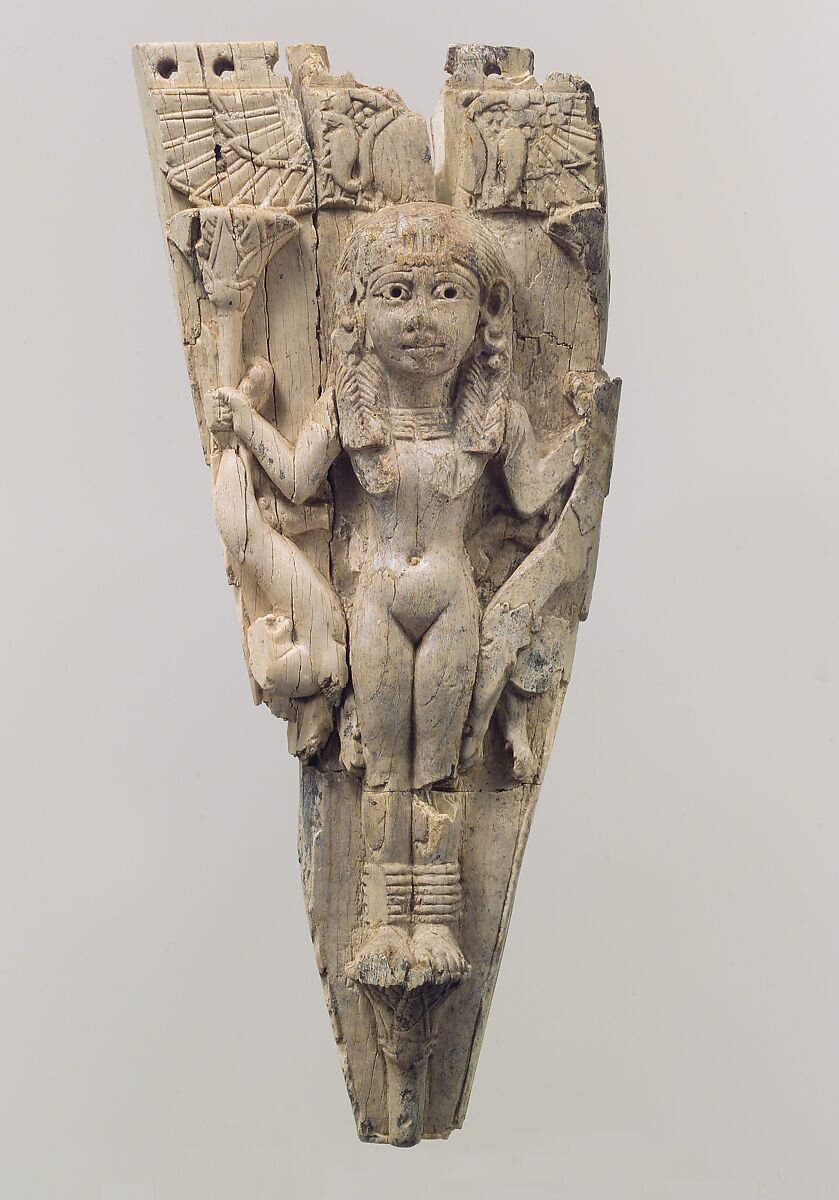 Horse frontlet carved in relief with a female figure flanked by lions, Ivory, Assyrian