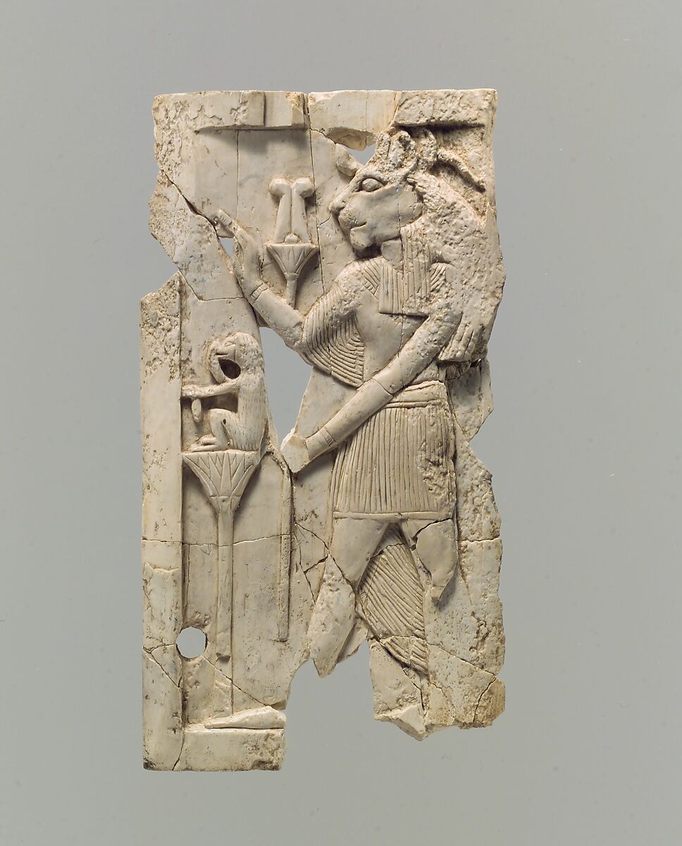 Furniture plaque carved in relief with lion-headed figure, Ivory, Assyrian