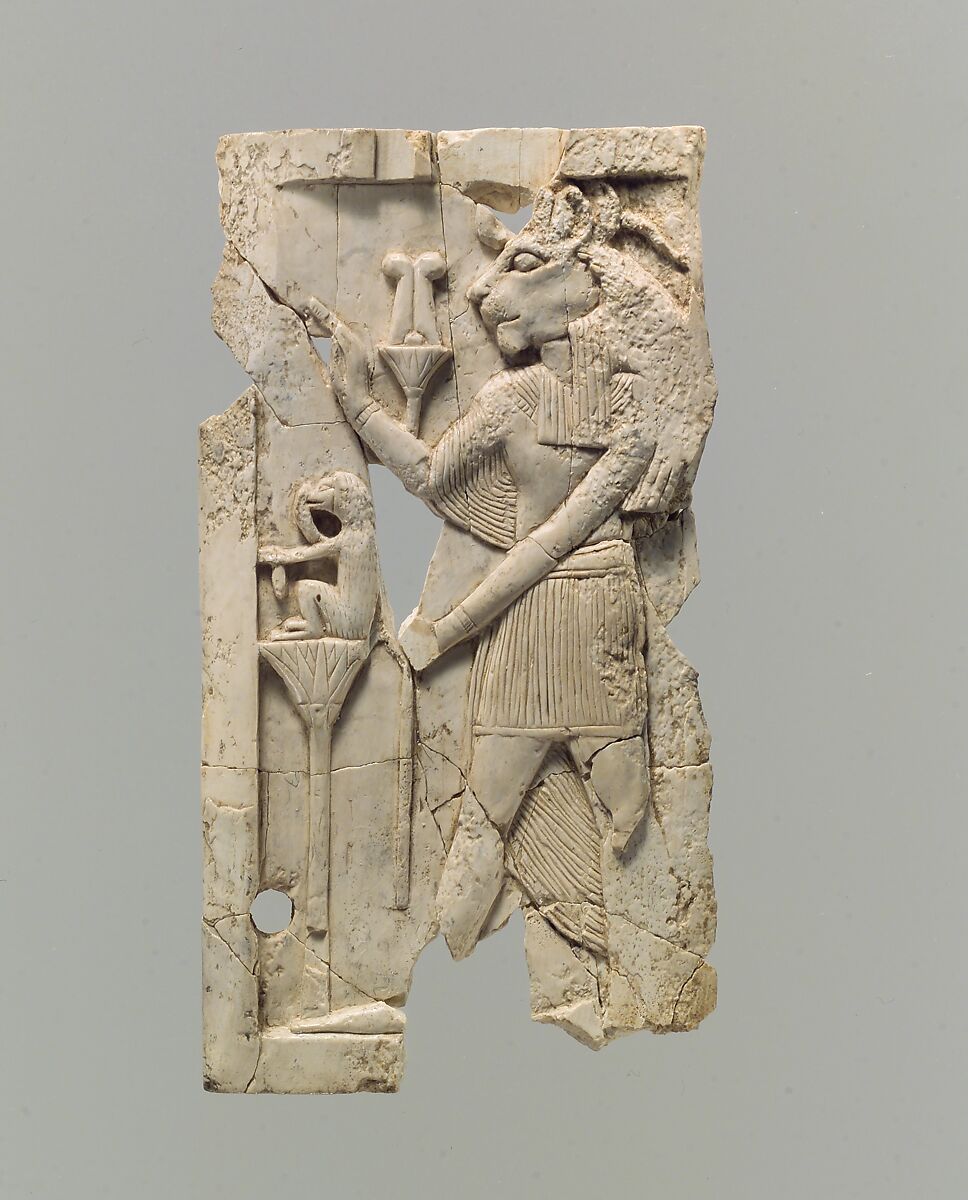 Furniture plaque carved in relief with lion-headed figure, Ivory, Assyrian 