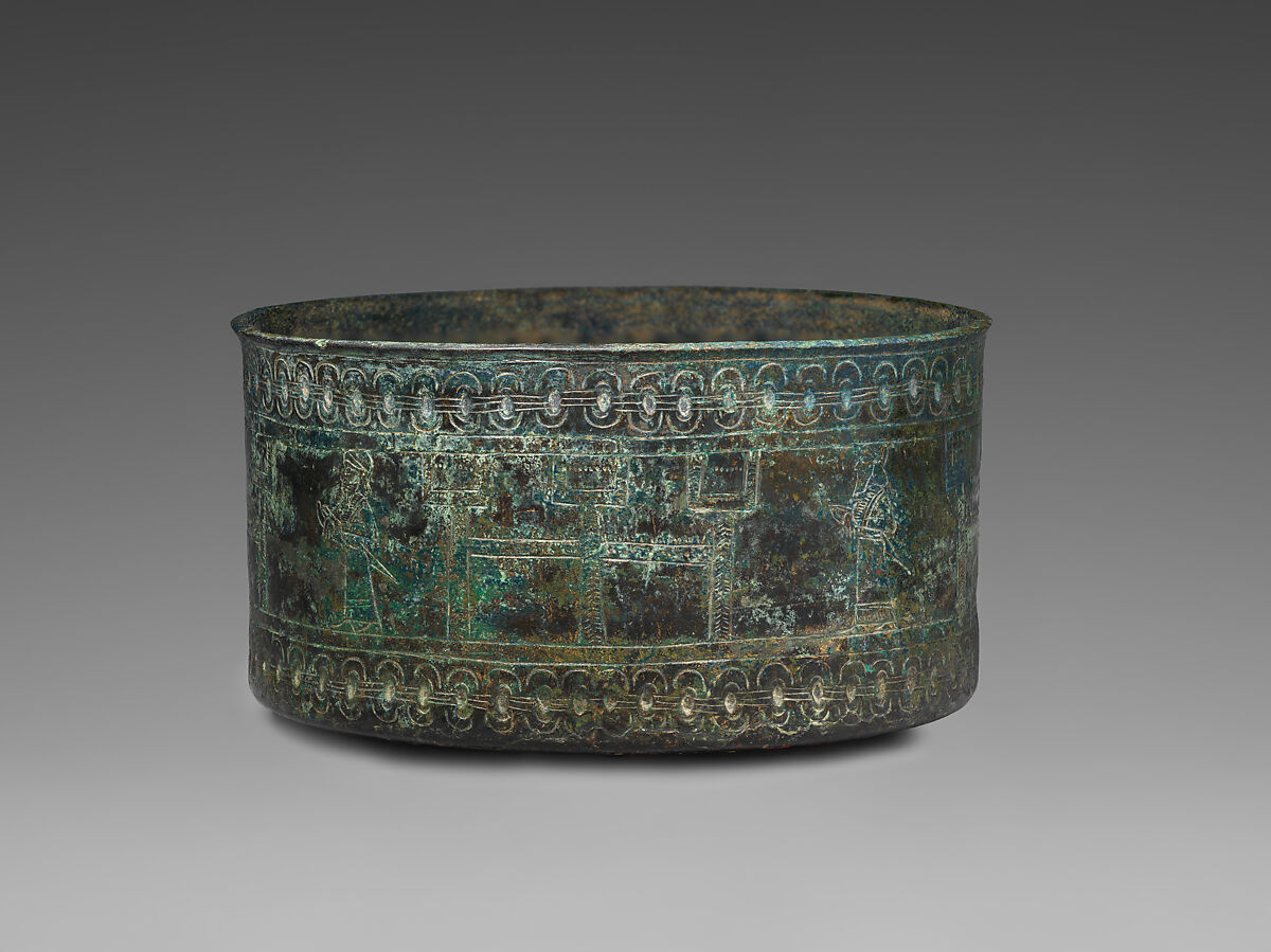 Circular box; alternating male figures and three-towered fortresses, Bronze, Iran